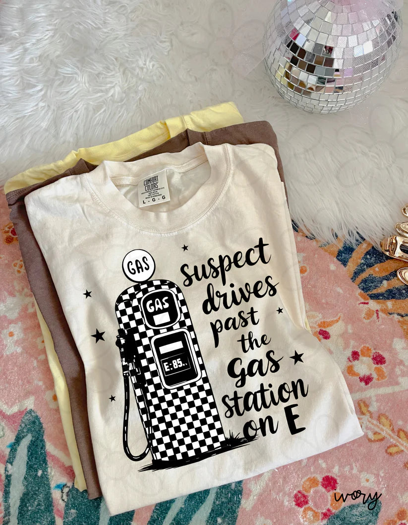 Checkered Suspect Drives Past Gas Station On E DTF Transfer