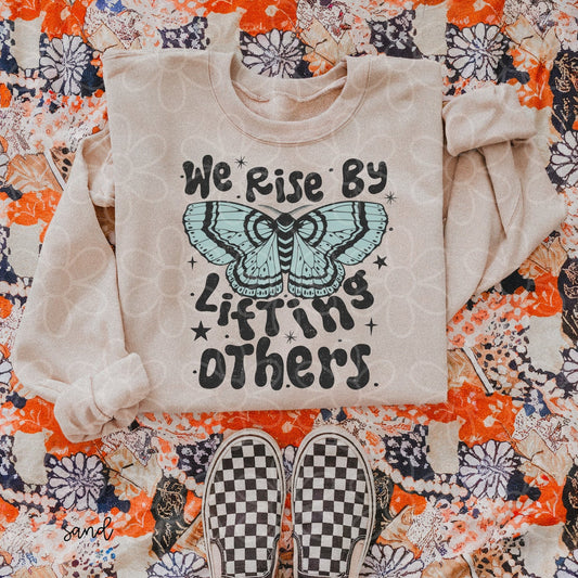 We Rise By Lifting Others DTF Transfer
